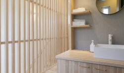 2Fトイレの洗面スペースと階段の格子デザイン